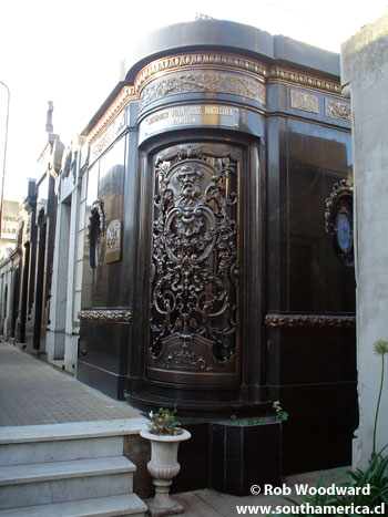 An ornate black tomb at Cementerio Recoleta Cemetery