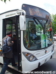 The front of a green Santiago Bus