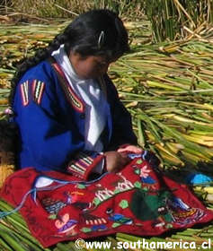 Girl weaving on the floating islands of Lake Titicaca