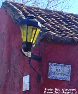 Lamp and sign on Calle de los Suspiros, Colonia, Uruguay