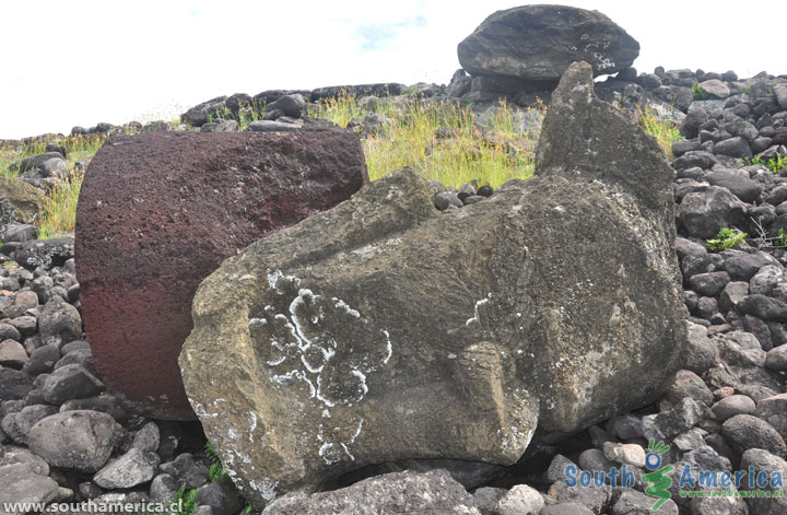 A large fallen head and Pukao at Ahu Akahanga on Easter Island
